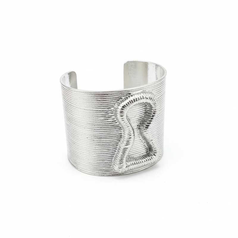 Silver cuff bracelet on a dark surface with 'Add to cart' and 'Buy now' buttons.