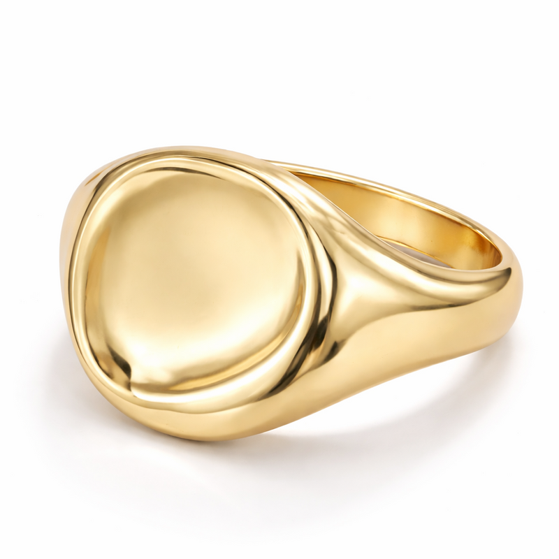 COCOA ARI modern gold signet ring with smooth, polished finish on white background