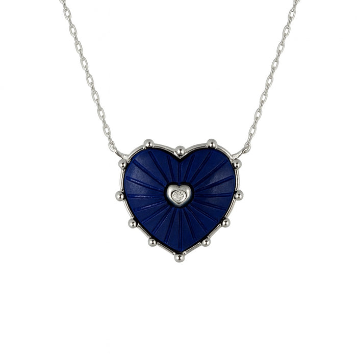 Heart-shaped blue pendant with a diamond on a silver chain
