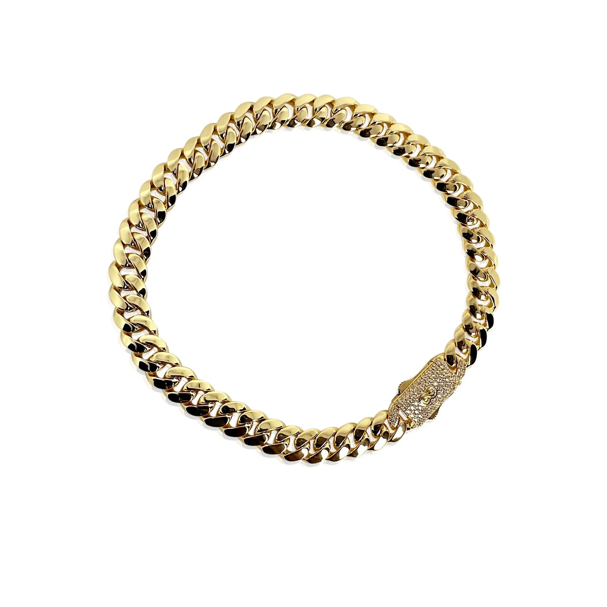 gold cuban with cz bezel on white background