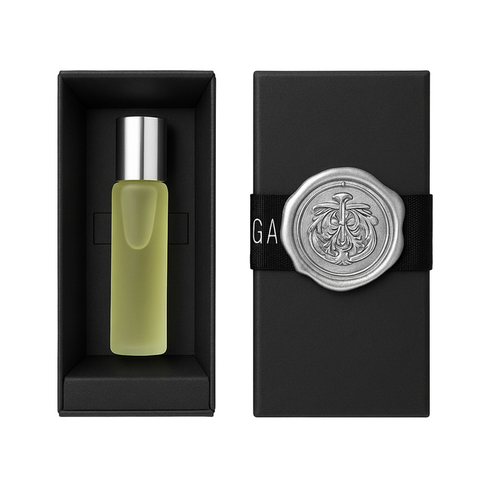 Bottle of perfume oil, with silver cap in a black box, featuring a wax seal with COCOA ARI branding.