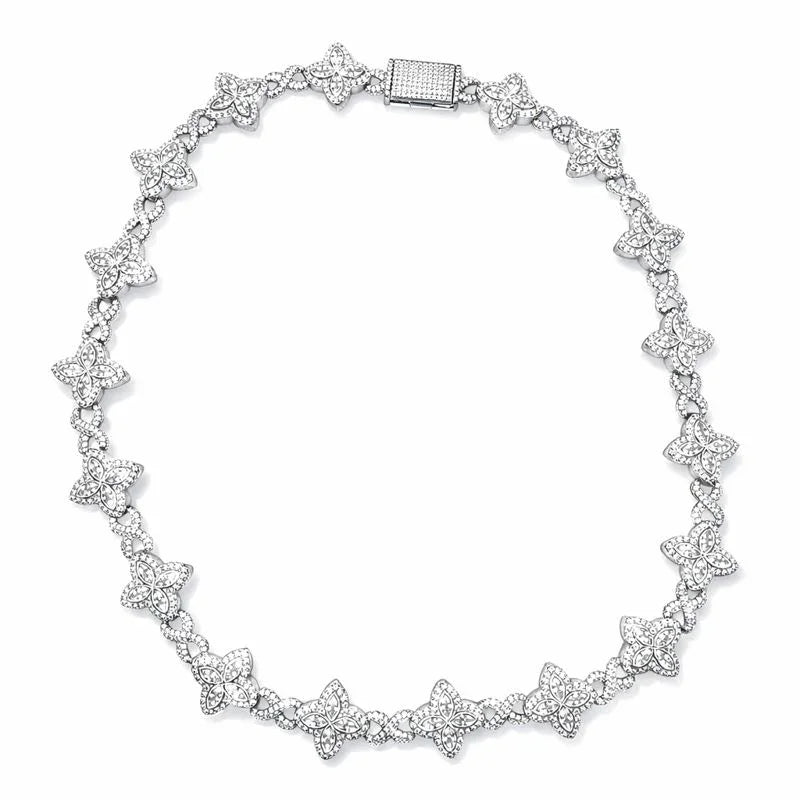 Silver bracelet with star-shaped links on a white background