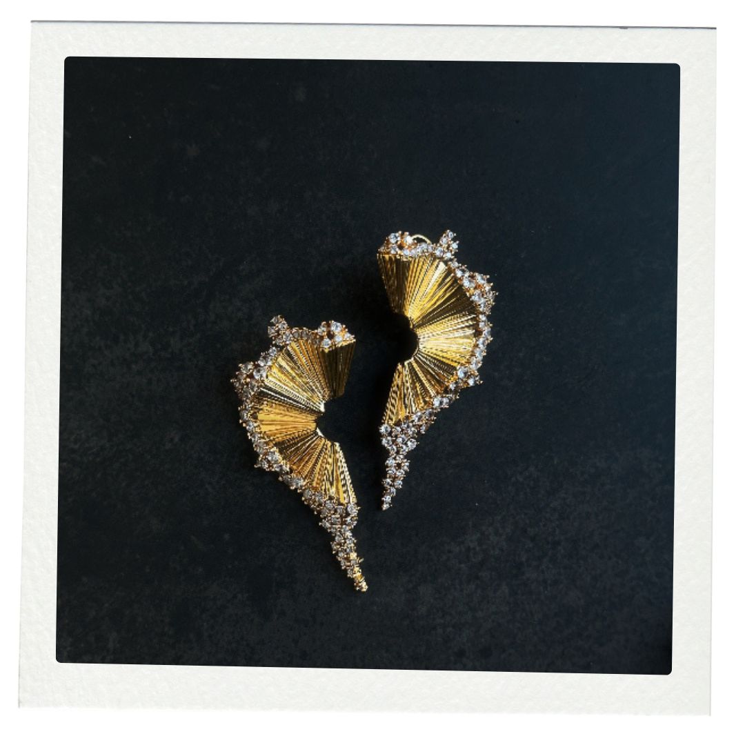 Gold fan earrings with cz diamond around the sides