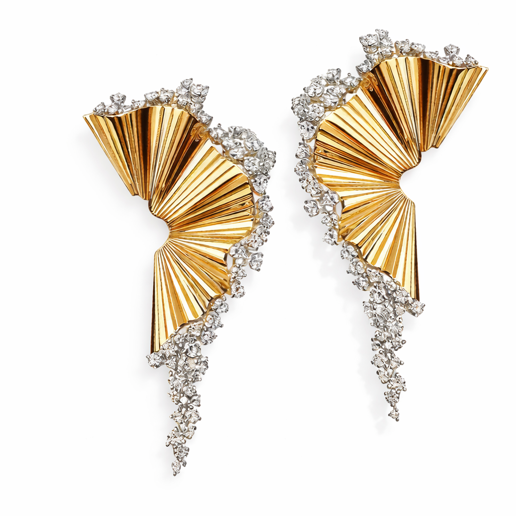 sculptural fan shaped gold earrings with cz diamonds around edge