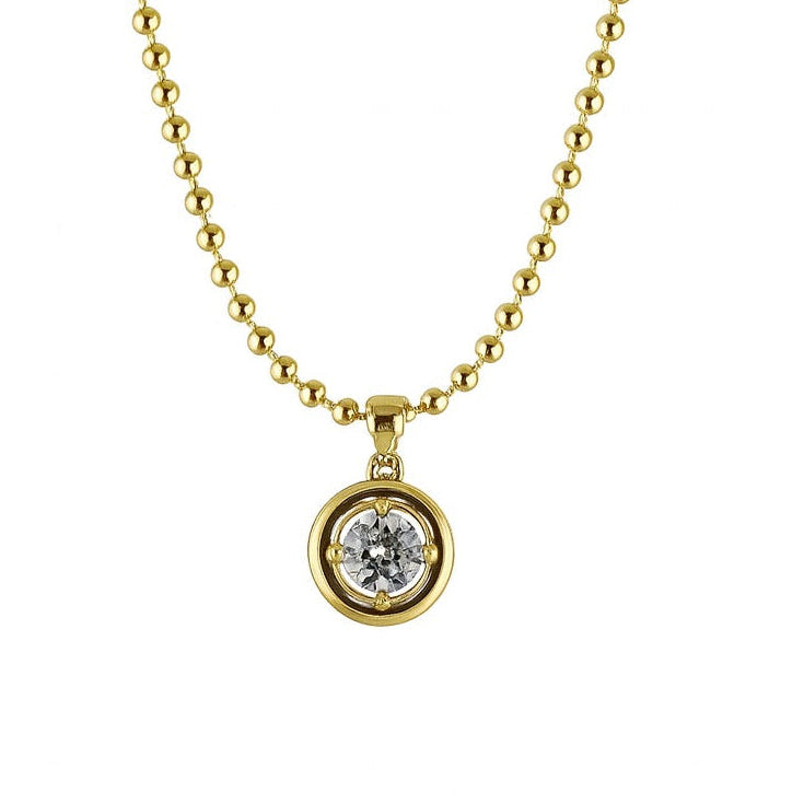 Gold necklace with a round diamond pendant on a white background