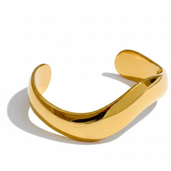 Gold bracelet on a white background