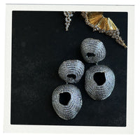 Sculptural Silver circular earrings