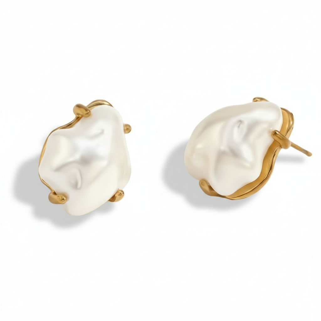 Pair of pearl earrings with gold accents
