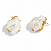 Pair of pearl earrings with gold accents