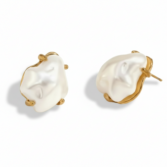 Pair of pearl earrings with gold accents