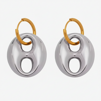 Pair of modern dangle earrings with gold and silver components