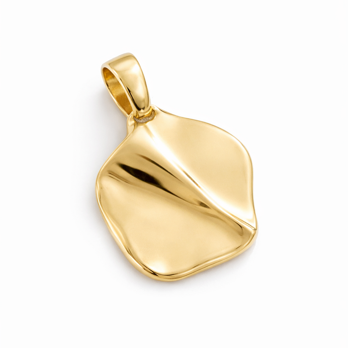 Gold pendant on a white background