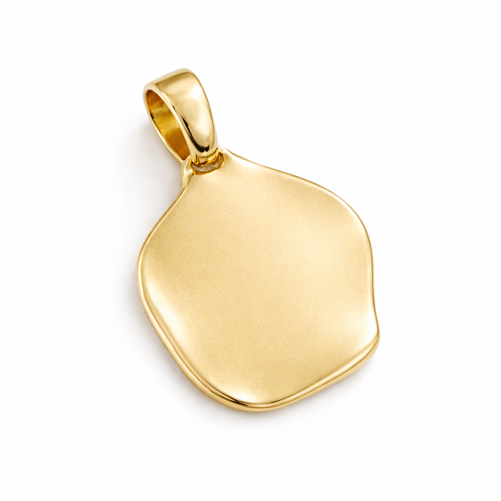 Gold pendant on a white background