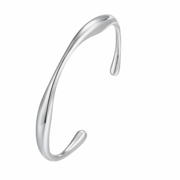 Silver wavy bangle on a white background