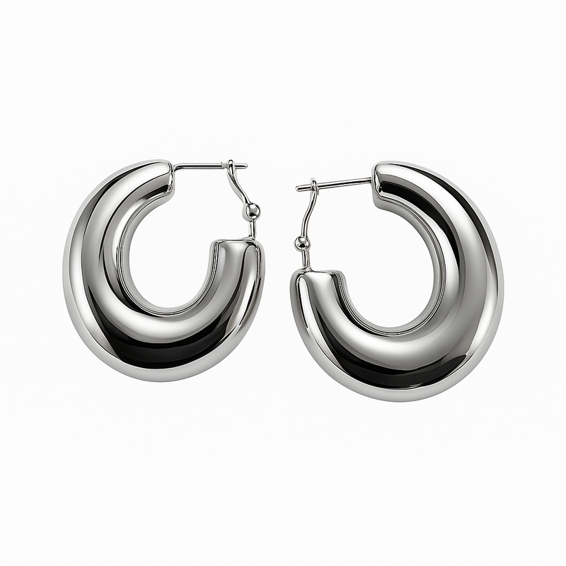 Pair of silver hoop earrings on a white background