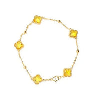 Gold bracelet with yellow crystal gemstones