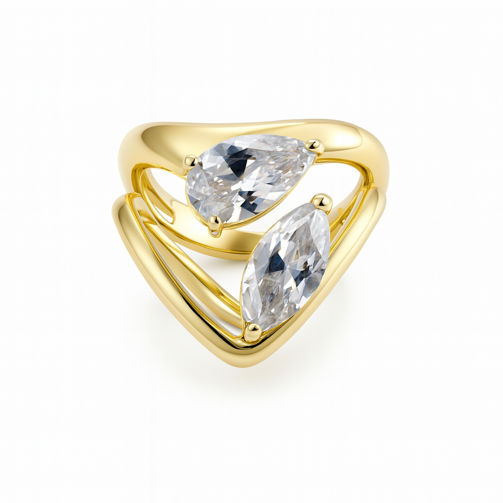 Gold ring with two clear gemstones on a white background