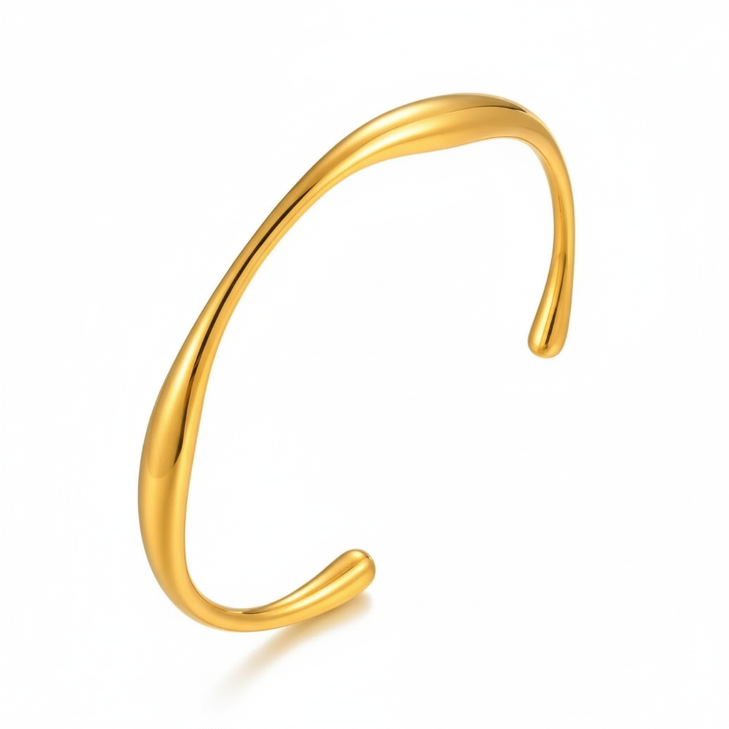 Gold bangle on a white background
